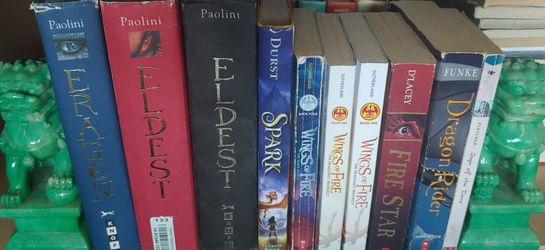 Dragon books Eragon, wings of fire, dragon rider etc