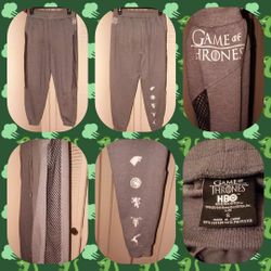 Women’s Game of Thrones sweats with sheer fishnet details on both sides of pants. Symbols down back of calf in back. Size S $25