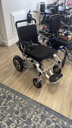 NEW FOLDABLE LIGHTWEIGHT POWER CHAIR