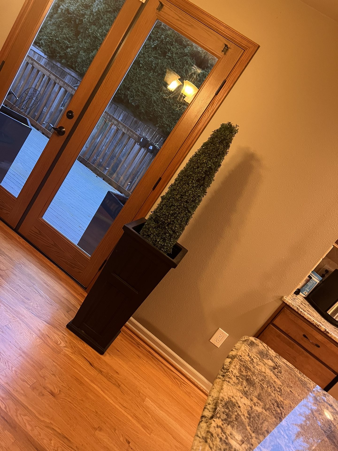 Planters with artificial trees