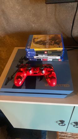 Uncharted 4 ps4 with ps4 controller and 5 games
