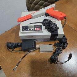Nintendo NES Console with Zapper and Controller and Mario Game