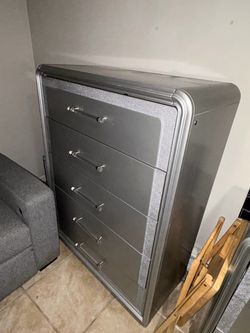 Negotiate got bed dresses  table and couch