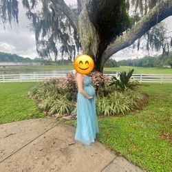 Elegant maternity dress with beautiful lace appliques in the bust area. 