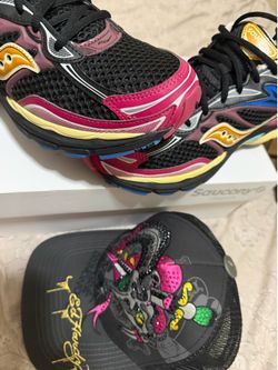 Saucony sneakers with matching hat