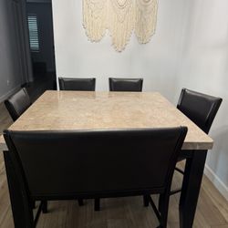 Haverty’s marble counter height dining room table for sale 