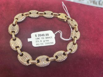 10k Gold bracelet 23.9 grams CZ stone layway available 10% Dwon if you interested please make sure you ask for Maribel thank you