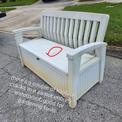 Small hairline crack outdoor deck storage box bench