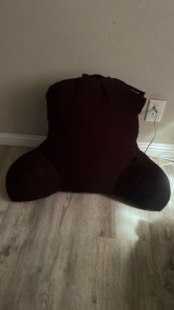Pillow with arms for rest