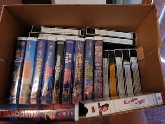Disney VHS Tapes along with a Variety of other Titles