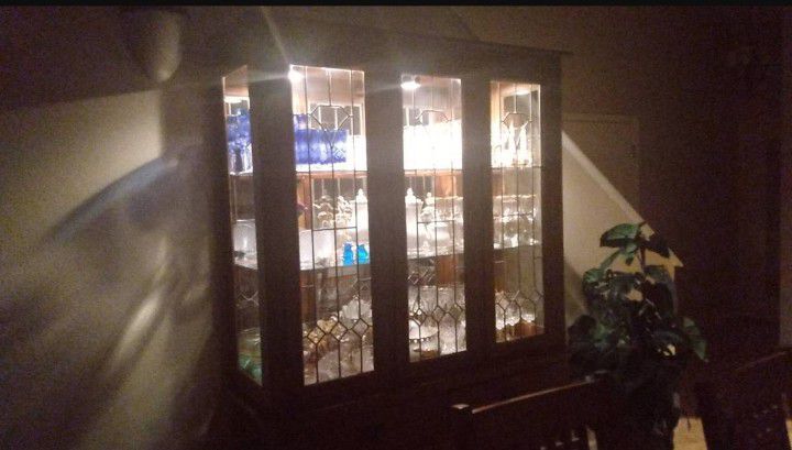 China cabinet with matching formal dining table