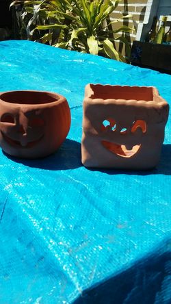 TWO HALLOWEENY CLAY POTS
