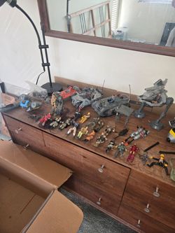 Toys, action figures, tanks, all types of vehicles and boats,
