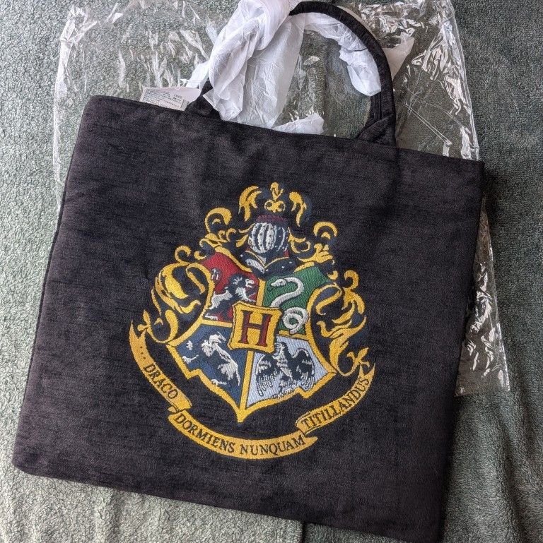 Brand new Harry Potter purse with snap on button