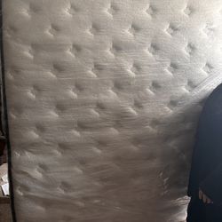 Brand new never opened 12 inch queen mattress