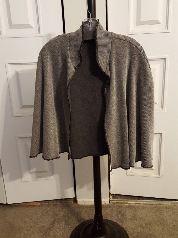 Black/white Cape/poncho. NEW NEVER WORN