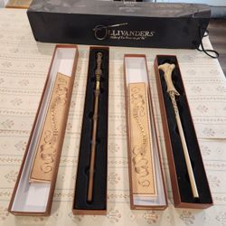 2 Harry Potter wands in Ollivanders wand boxes and bag- Lord Voldemort's Wand, Dumbledore Wand, great condition 