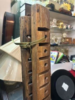 Vintage wooden tool used for weaving straw mats