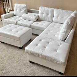 New white leather L-shaped sectional sofa couch with storage ottoman and drop down cupholders 