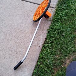 REDI MEASURE 1000 FT,  BIG WHEELS, ADJUSTABLE  HANDLE  ,LIKE NEW