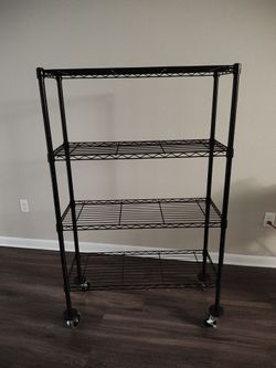4 shelf rolling cart, 59" tall with wheels.