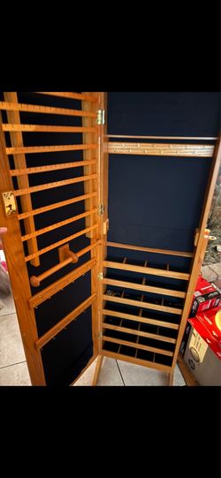 Jewelry Armoire Cabinet with mirror in great shape