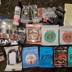 HUGE ASSORTMENT- Acoustic Guitars, Various Strings, Stands, Strap, Harmonica, Books, AND Much More!!!