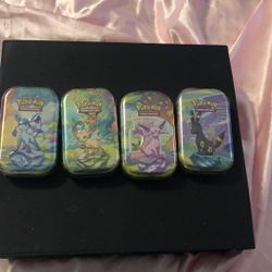4 Prismatic Tins 