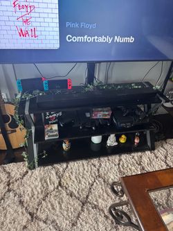 Black Glass TV Stand / Entertainment Center