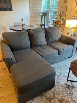 Gray midsize sectional pullout couch