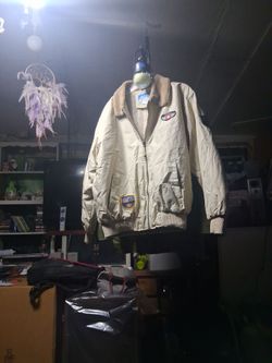 This is a vintage-style flight or bomber jacket featuring