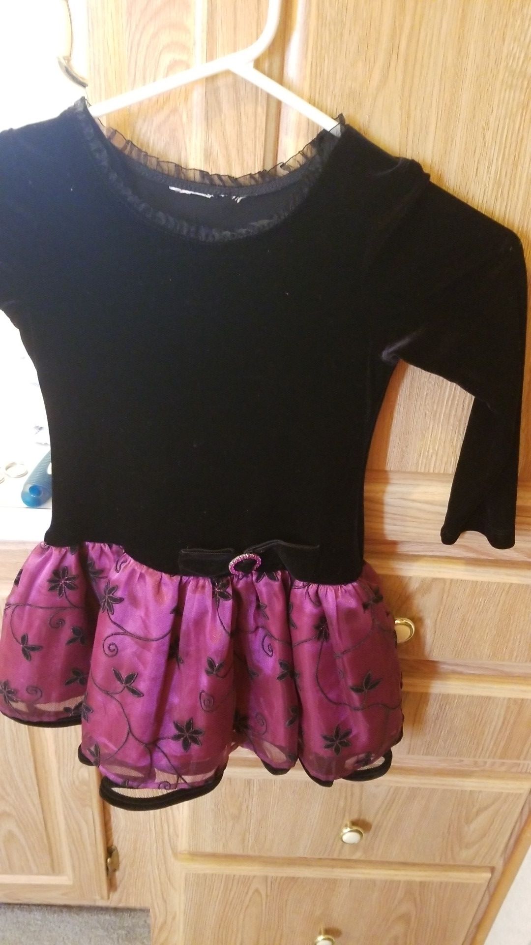 This is a very cute holiday dress dark maroon and black velvet