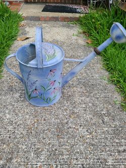 Besutiful watering can