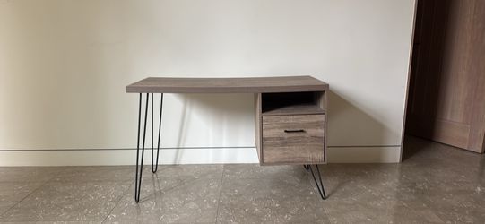 Wooden desk with a drawer