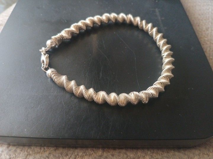 Unique Sterling Silver Twisted Metal Braclet 