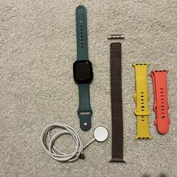 Apple Watch Series 4 with charger & 4 bands