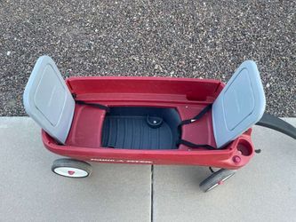 Radio Flyer Pathfinder wagon features gray fold-down seats with seat belts and includes four built-in cup holders