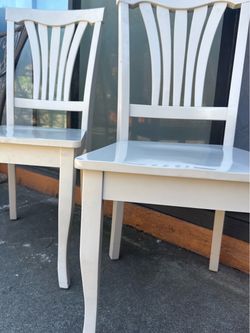 Two white chairs