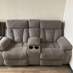 Set Of Two Grey Recliners 