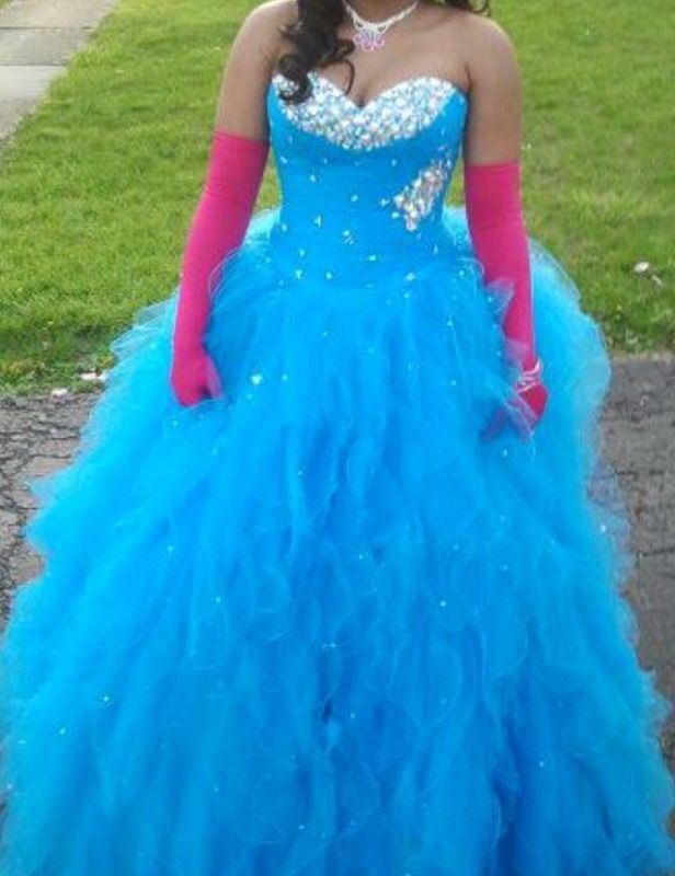 Henris prom dress peacock blue .. Corset top best offer