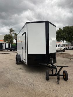Trailer enclosed 6 x 12 7 feet interior come with a spoiler titanium Cargo financing available