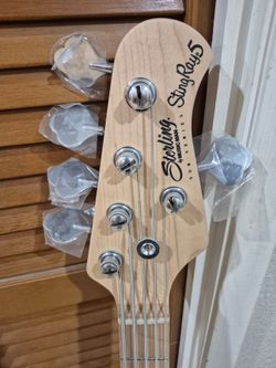 Sterling By Music Man StingRay5 bass Guitar. Like New Condition Not Played. Tested Working Sounds Electronics.