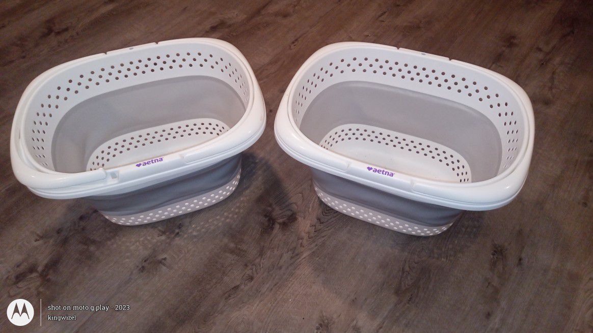 2 Aetna White Laundry Baskets