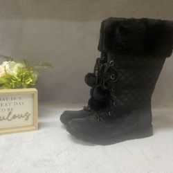 NWT Jellypop black faux fur quilted boots. Size 8.5