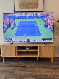 Light wood TV stand/credenza with storage (TV not included)