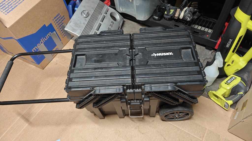 husky rolling tool box with bunch of random tools