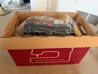 Singer Sewing Machine W/ original manuals