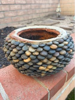 Rock planter. Check pix. Spray paint on one side