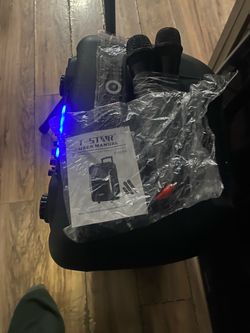 Bocina recargable para karaoke nueva 2 micrófonos control remoto y tripié 1