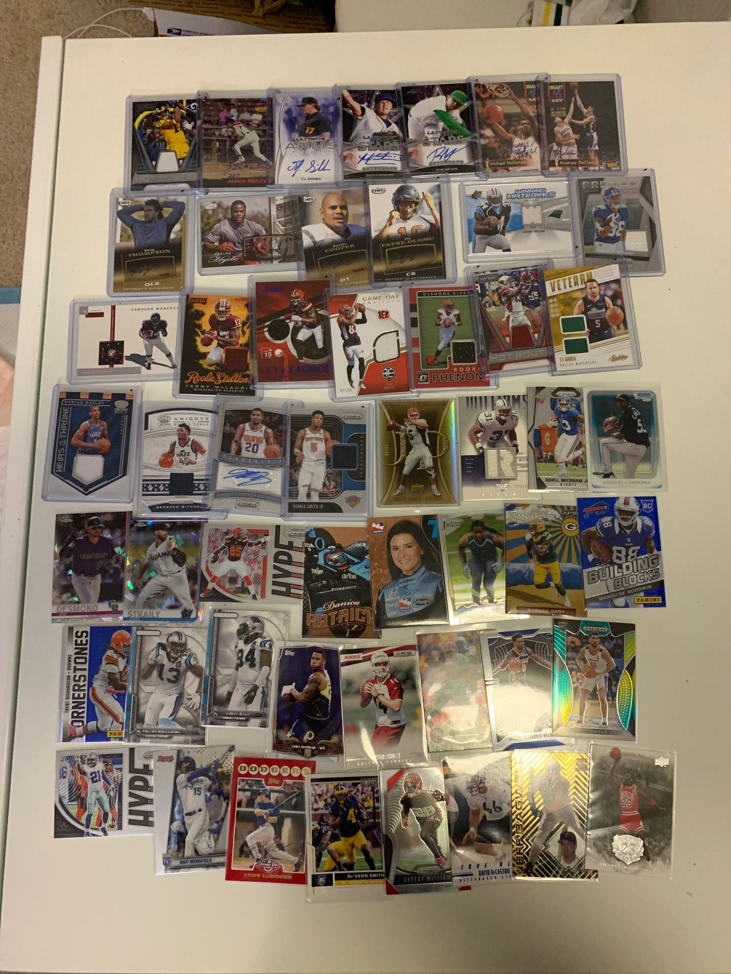 Bundle of basketball baseball and football cards autographs jersey cards rookie cards Jordan LeBron